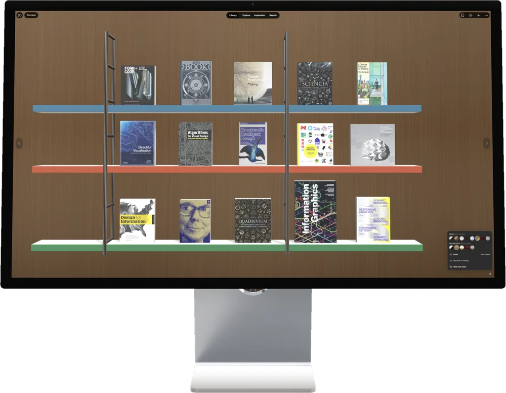 Biblio on a Studio Display: a wooden wall with blue, red and green shelves of hardcovers.